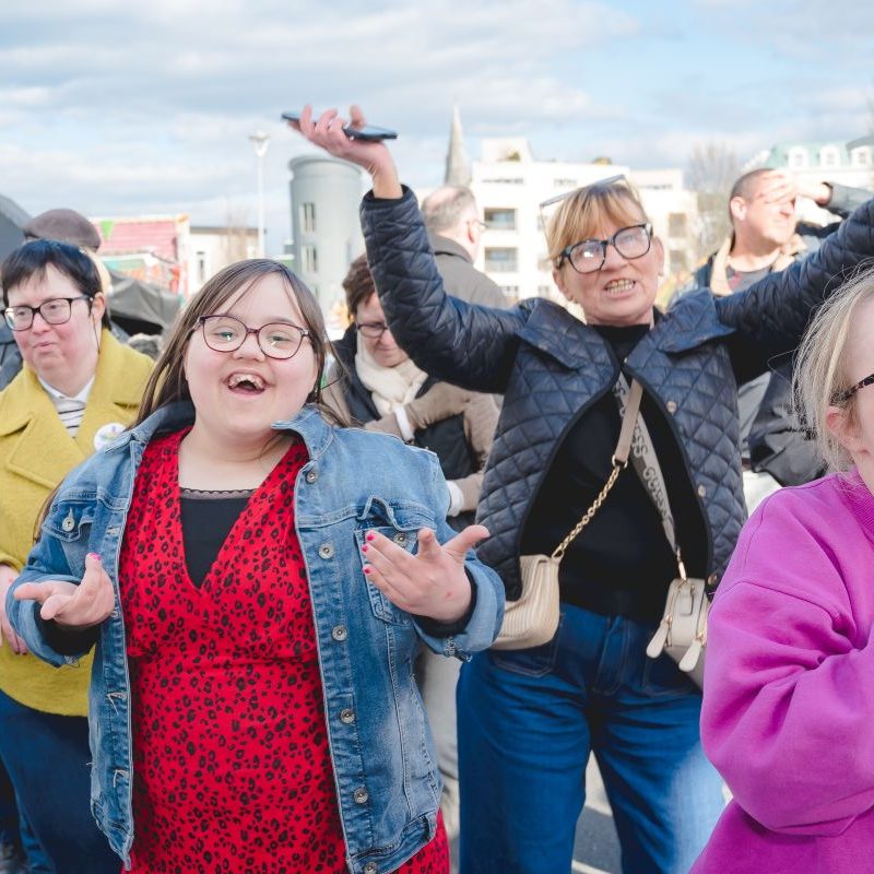 adults and kids dancing at the Ablefest celebrations
