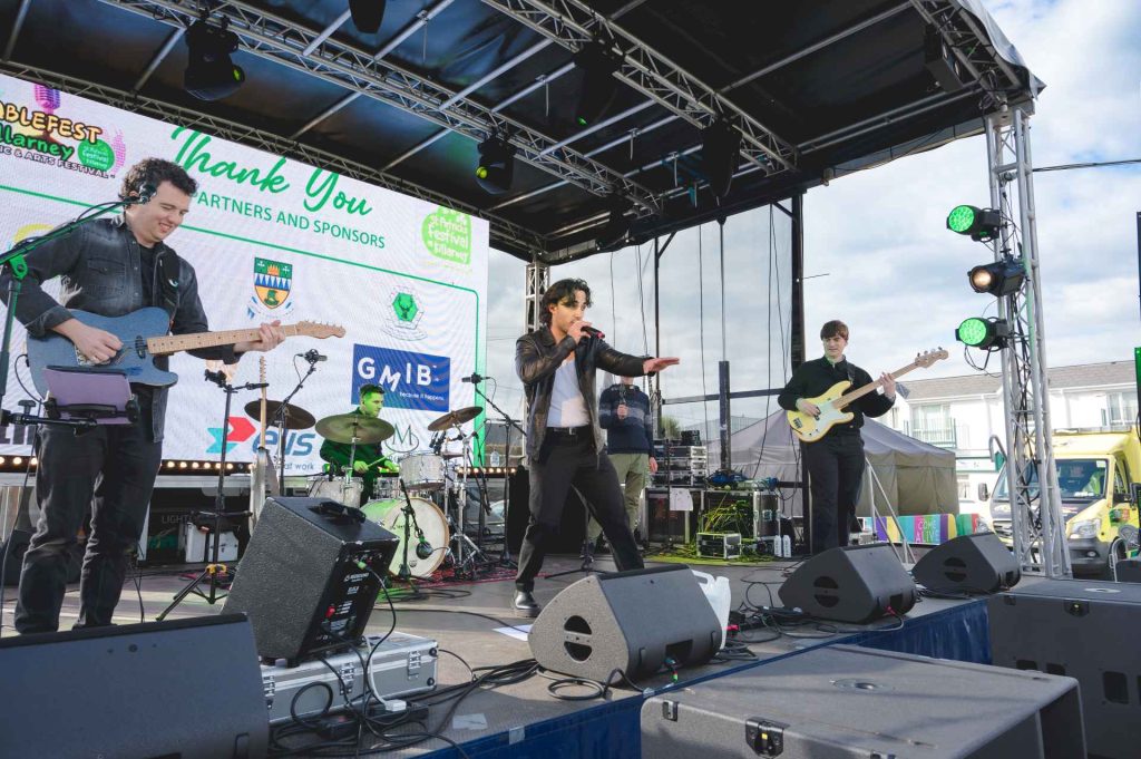 Jake Carter on stage performing at Ablefest